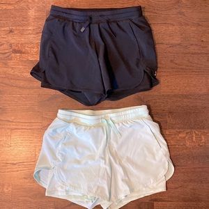 Two pair girls athletic shorts black and light teal/blue